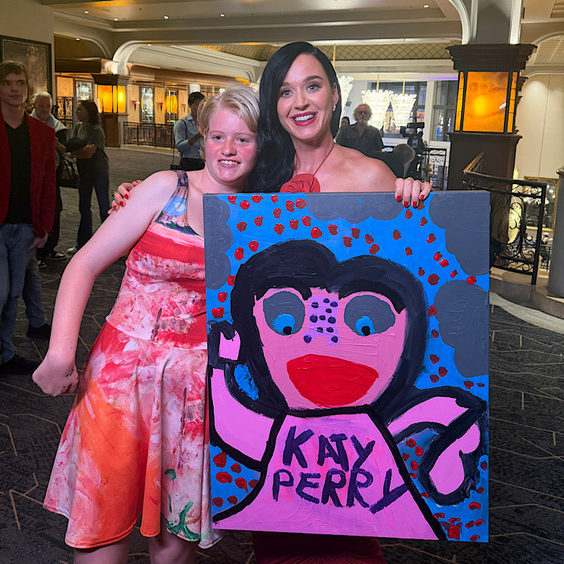 Clara Woods gives an artwork to Katy Perry!