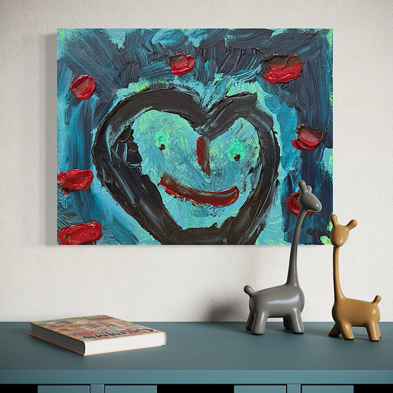 Abstract painting with a heart and red elements on a wall above a table with decorative items. Artwork "Faith" by Clara Woods