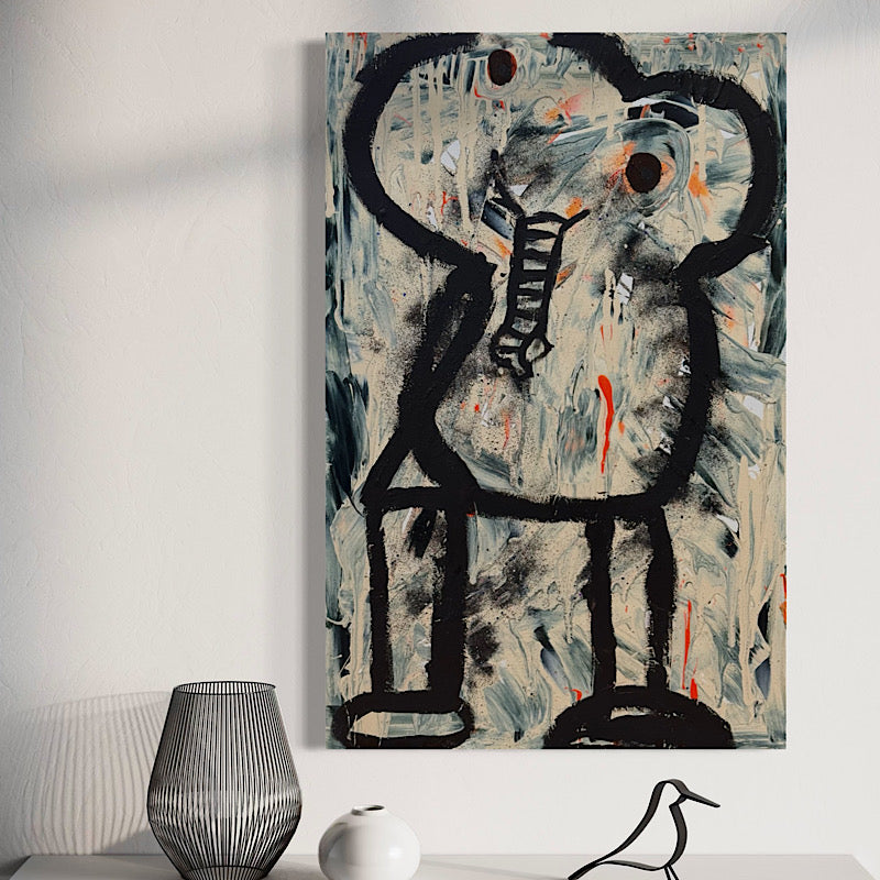 Abstract artwork on a wall with decorative items below. Artwork The Elephant by Clara Woods
