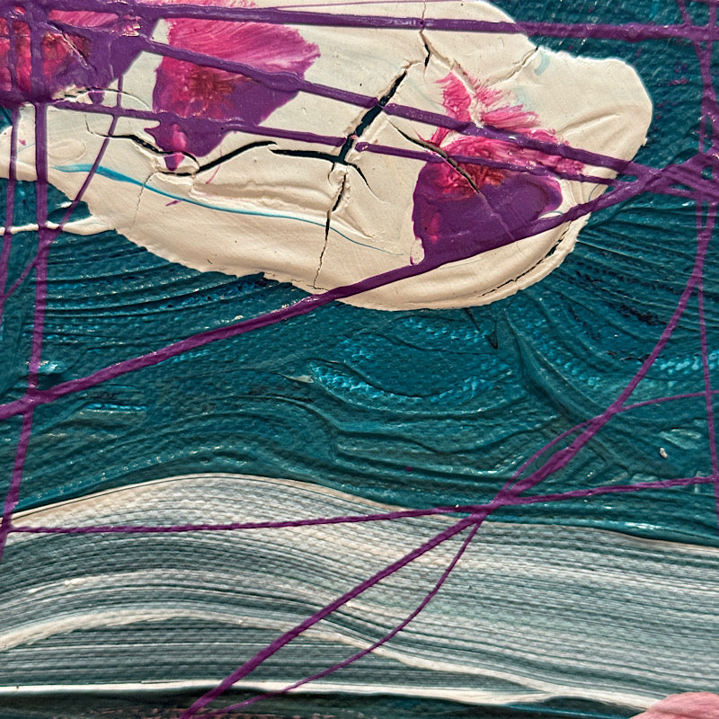 Abstract art piece with purple strings and textured surface
