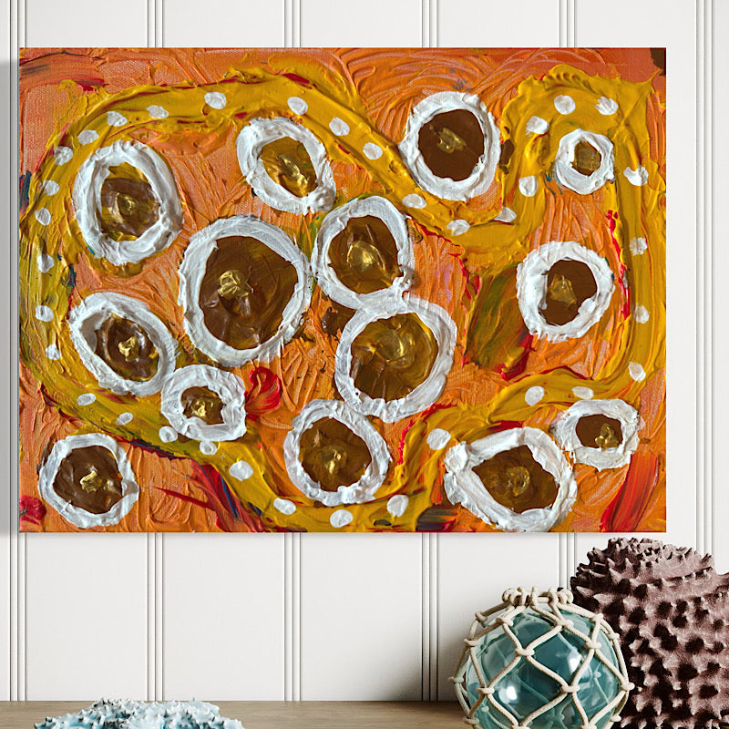 Little Saturn close-up detail — white impasto rings with gold leaf centers on layered orange and yellow acrylic, expressive brushwork, Clara Woods Collection, 2026