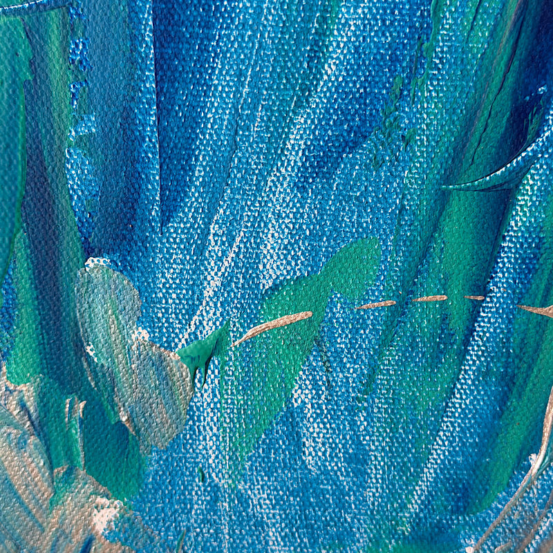 Little Ocean 03, side view of canvas showing thick teal and dark blue painted edges in studio with colorful paintings in background
