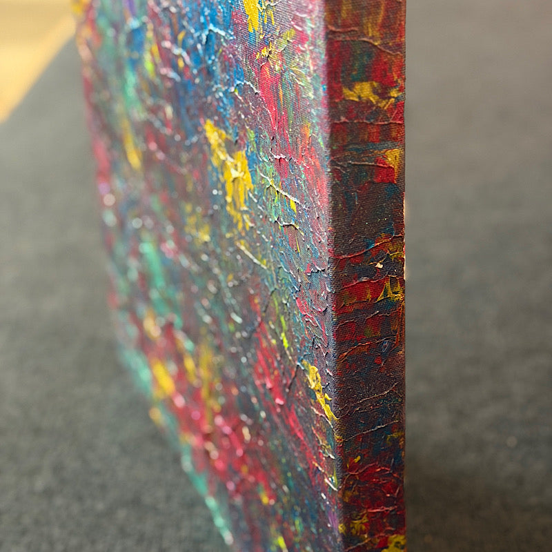 Purple Magic, Original by Clara Woods — macro detail of the central section, layered deep purple and dark crimson acrylic with teal, yellow and red accent strokes radiating outward
