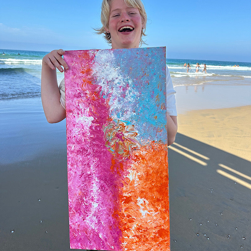 Beach Rose, Original by Clara Woods — back of the canvas showing title BEACH ROSE, serial number CW1336-2026, size 15x30 in, Clara Woods signature, and handwritten messages: You are loved! You are precious! You can! Believe! Keep going! The best is yet to come!